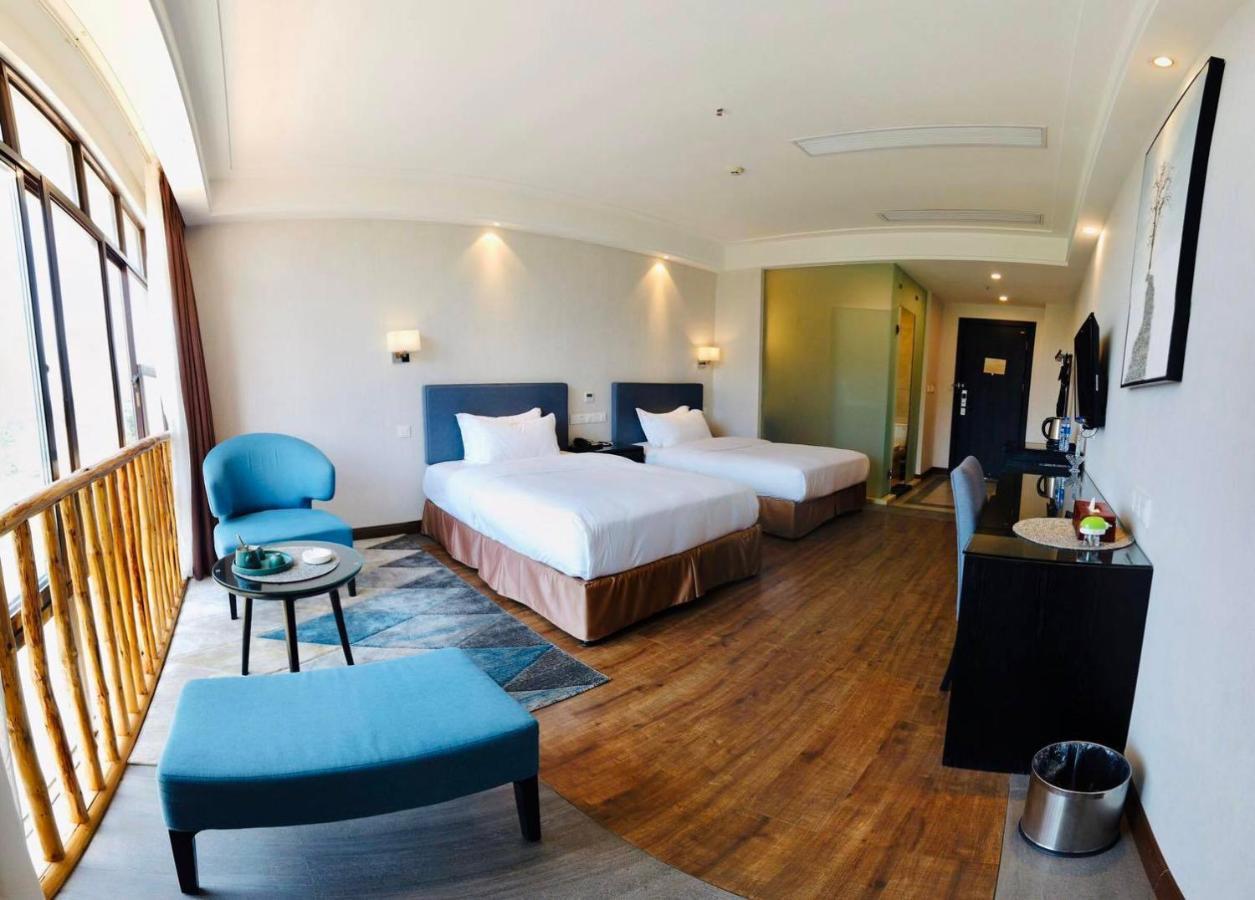 Emei Mountain Xileer Hotel Эмэйшань Экстерьер фото
