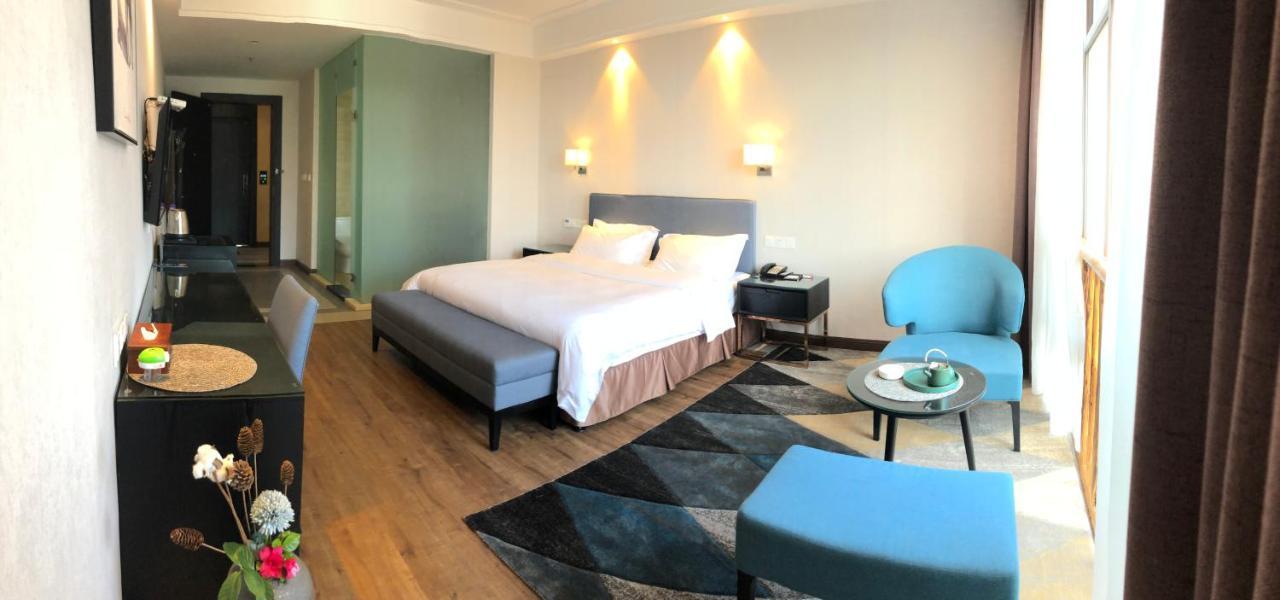 Emei Mountain Xileer Hotel Эмэйшань Экстерьер фото
